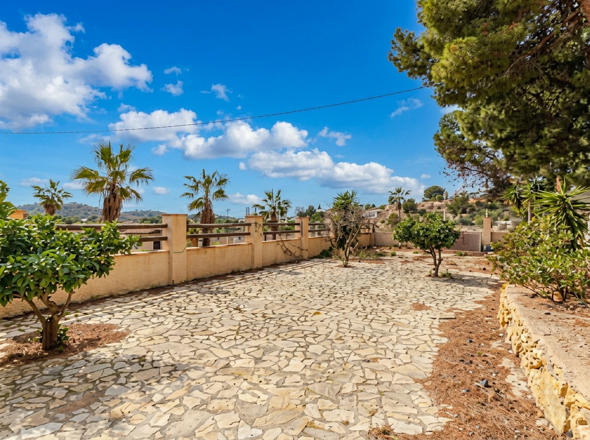 Terrace with fruit trees and hillside views