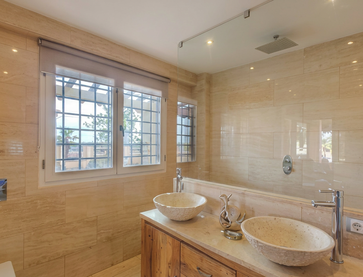 Bathroom with soaking tub and natural stone